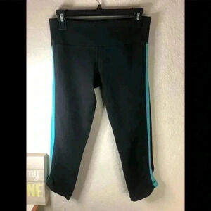 Lululemon black crop leggings with turquoise stripe 6